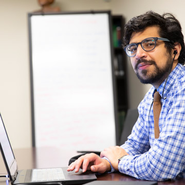 Student Working on Laptop